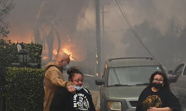 wildfire-in-los-angeles-suburb-forces-mass-evacuations