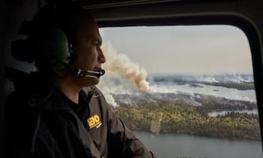 growing-wildfires-across-western-canada-are-forcing-thousands-from-their-homes