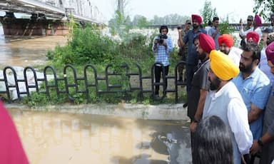 Chief Minister Mann reviews the rising water level in the Beas River