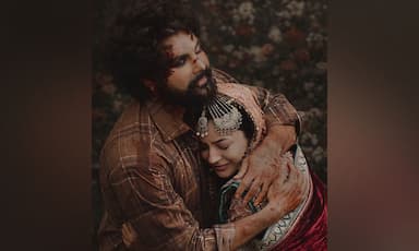 shehnaaz-gill-embraces-bloodied-jayy-randhawa-in-intense-first-look-of-ishqnama