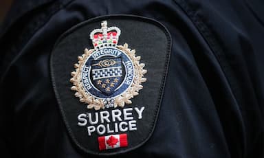 police-fire-crews-investigate-fatal-house-fire-in-surrey